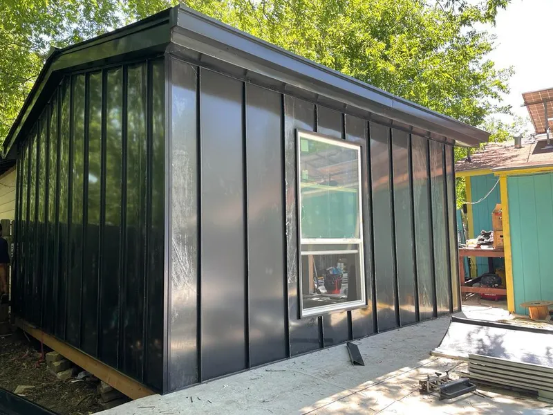 Black standing seam metal wall panels for Roof Inspection in Good Hope